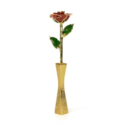 Red rose with gold detailing and green leaves displayed in an ornate gold vase by Infinity Rose