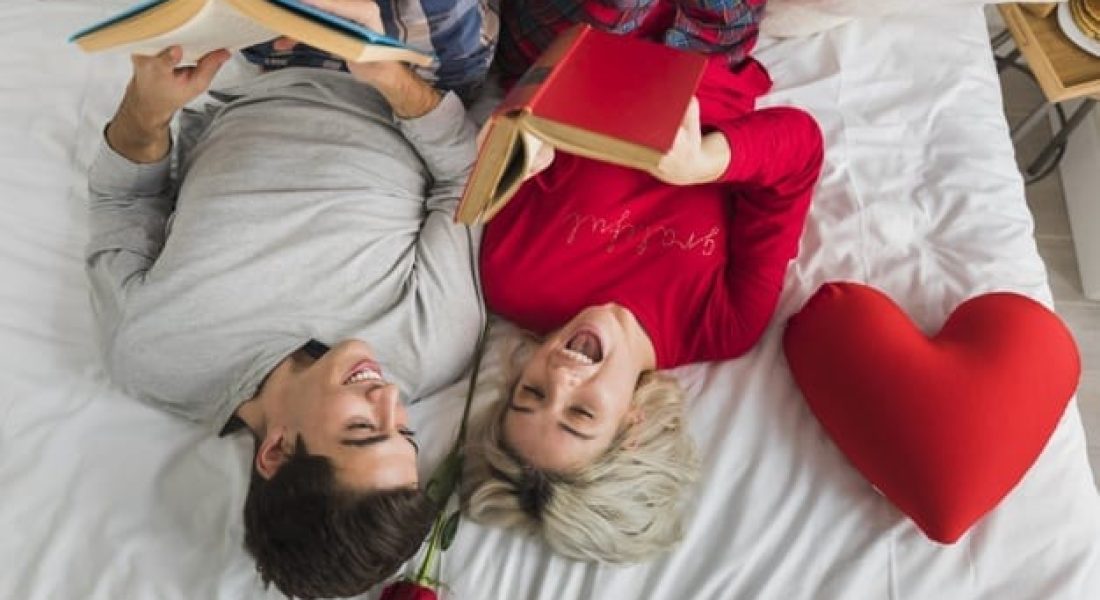 couple-reading-bed-valentines-day