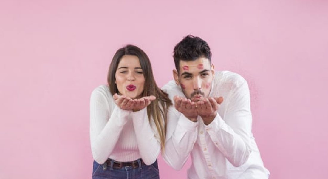 young-couple-blowing-kisses-